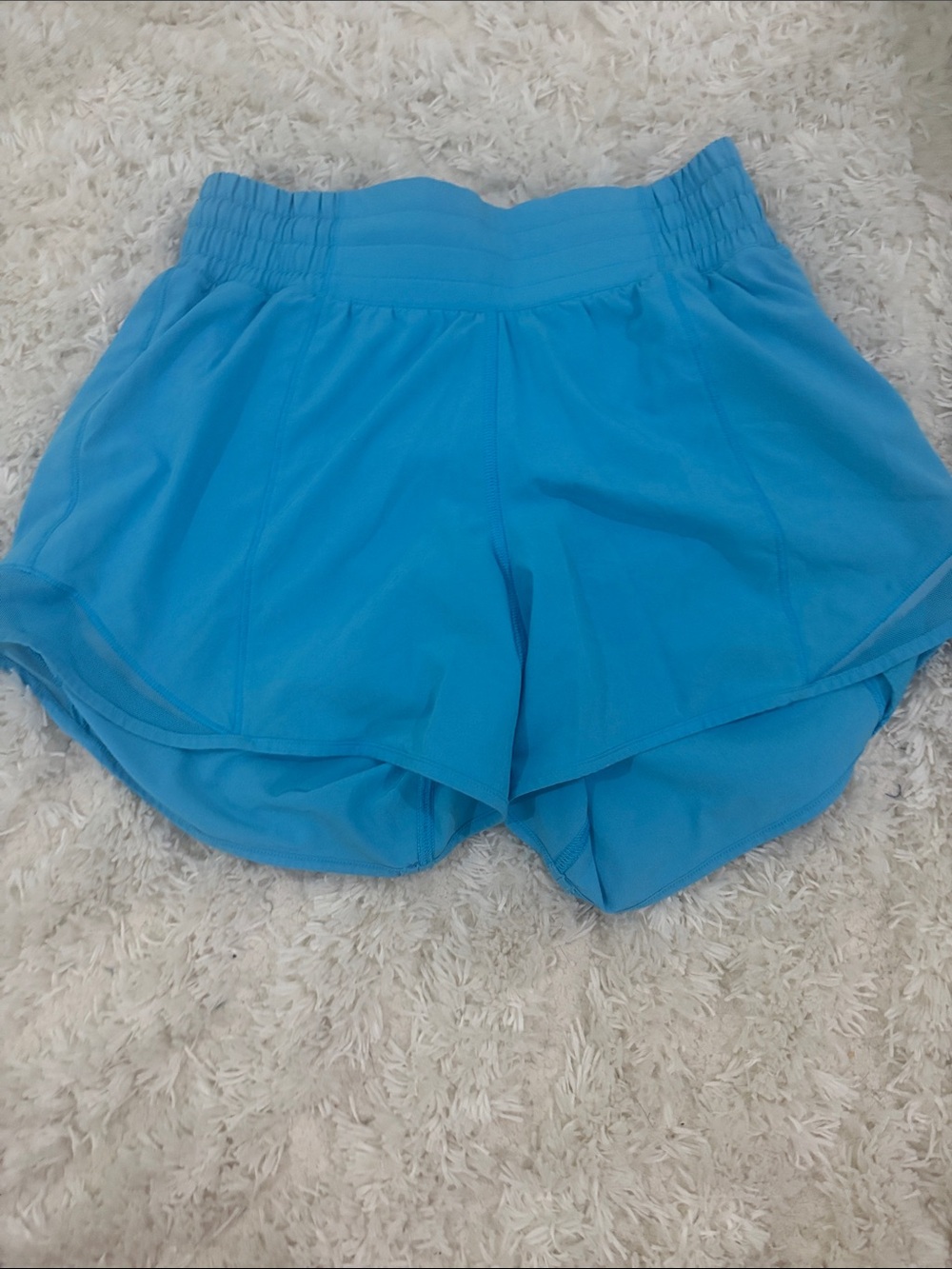lululemon blue shorts (last name written on inside)
